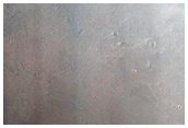 Volcanics and Sulfates Near Smectite Plains Northeast of Syrtis Major