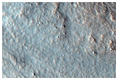 Possible Phyllosilicates in Crater Rim Near Mare Serpentis