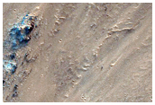 Small Crater Exposed in Cross-Section