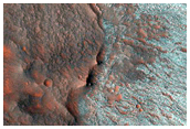 Crater on Floor of Tithoniuma Chasma