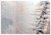Layering in Crater in Isidis Planitia