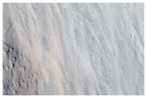 Light Toned Outcrops in South Wall of Capri Chasma