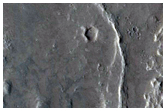 Curvilinear Ridge Traversing Two Terrain Types