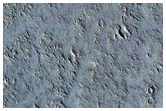 Possible Pyroclastic Deposits From Fissure by Tharsis Tholus