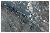 Layered Rocks Uplifted in Crater Near Solis Dorsa