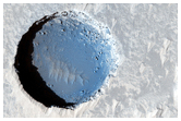 Pit in Daedalia Planum South of Arsia Mons