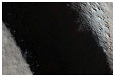 Collapse Pits on Olympus Mons Northern Flank