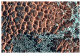 Monitor Slope Features in Central Pit of Elorza Crater