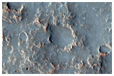 Possible Preserved Impact Melt Flow on the Ejecta of Bakhuysen Crater