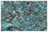 Crater Floor Deposit with Olivine and Pyroxene Signatures