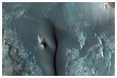 Dark Material in a Crater in the Arabia Region