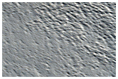 Small Channels in Ceraunius Fossae