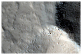 Collapse Pits on Northern Olympus Mons