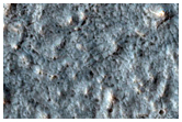 Reull Vallis and Tongue-Shaped Landform in the Centauri Montes