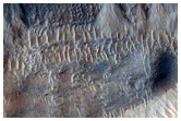 Monitor Slopes in Sirenum Fossae Graben