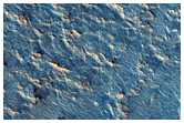 Edge of Crater Floor Deposit with Possible Olivine and Pyroxene Variability