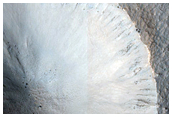 Monitor Slopes of Small Fresh Crater