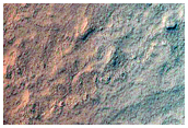 Exposure of Polar Layered Deposits Not Observed by MGS
