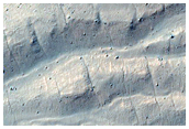 Monitor Steep Slopes of Asimov Crater