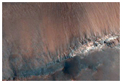 Monitor Slopes in Sirenum Fossae Graben