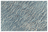 Possibilis terra plena olivini inter septentrionalem et solis occasum spectans ex Argyre Planitia