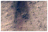 Candidate New Impact Site with Possible Ice