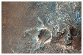 Crater in Northwest Noachis Terra with Possible Phyllosilicates in Wall
