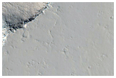 Cratres-puits  entre Ceraunius Fossae et Ascraeus Mons