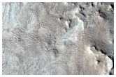 Thermally Variable Terrains North of Northern Antoniadi Crater