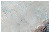 Foss interagissant avec un cratre dans Icaria Fossae