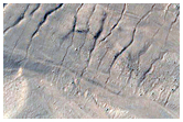 Monitor Steep Slopes of Asimov Crater