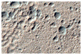Linear Cluster of Pits in Mid-Latitude Crater Floor Material