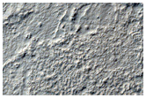 Weird Circular Landforms on Hellas Region Floor