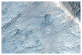 Impact Crater Exposed By Erosion along Candor Chasma