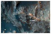 Slope Features along Coprates Chasma Ridge