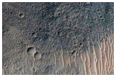 Impact Crater Exposing Bedrock