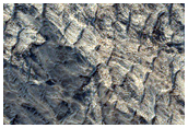 Light-Toned Stratified Materials in Hebes Chasma