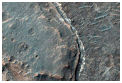 Exposures of Light-Toned Layered Material along Ladon Valles Floor