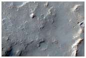 Possible Preserved Impact Melt Flow on the Ejecta of Bakhuysen Crater