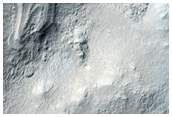 Inclined Layers on Crater Floor
