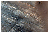 Tilted Layers in Center of Oudemans Crater