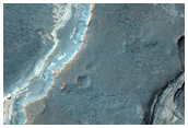 Light-Toned Layered Deposits in Uplands West of Ladon Valles Basin