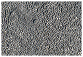 Channel with Evidence of Lineated Valley Fill and Terraced Craters