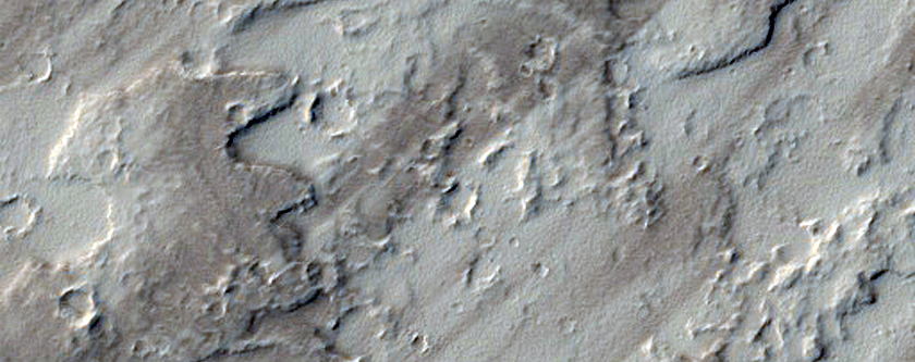 Piccoli coni craterizzati e strani flussi di lava a sud di Ascaeus Mons