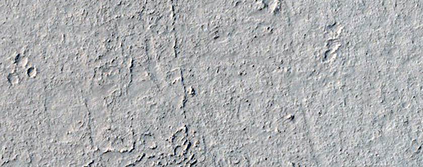Platy Flow Surface and Termination of Cerberus Fossae Trough System