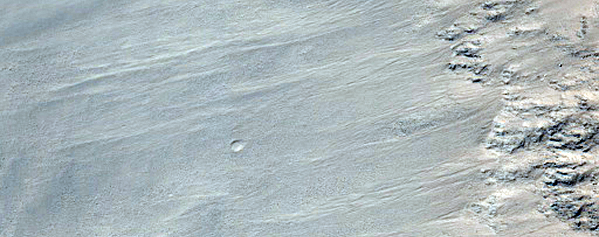 Impact Crater in Southeast Isidis Planitia
