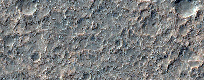 Exposio de silicato nas plancies ao leste de Eos Chasma