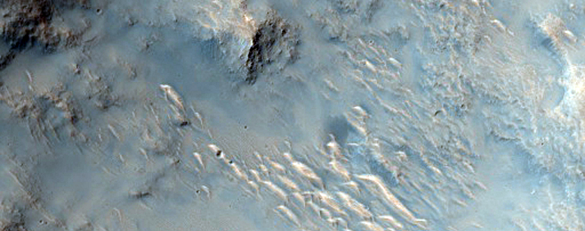 Streamlined Shapes in Flat Floored Valley in Western Libya Montes