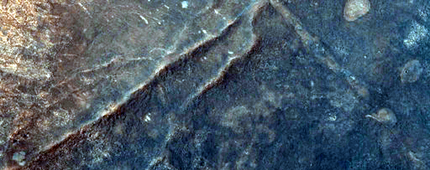 Low Albedo Area in Northern Nilosyrtis Region Crater