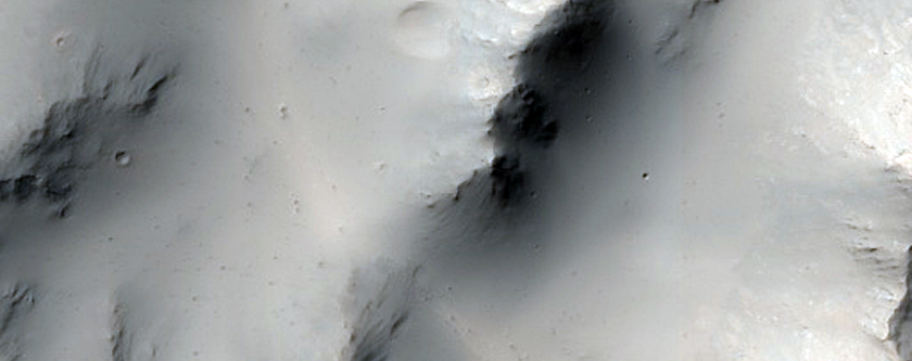 Well-Preserved Crater with Asymmetric Layered Ejecta